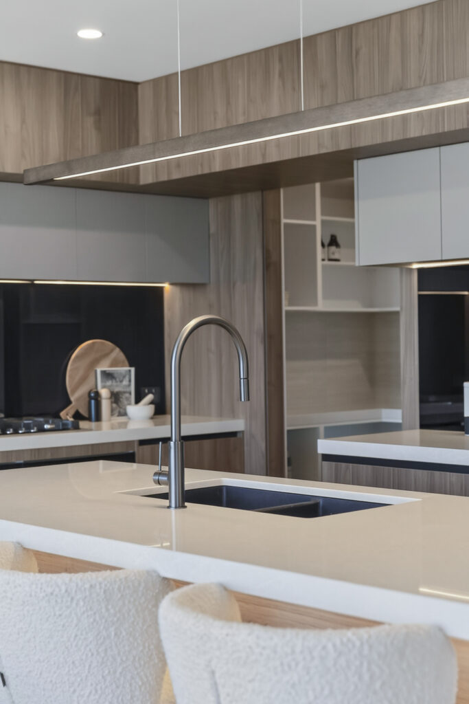 Modern kitchen island with sleek black sink